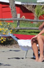 LUCY MECKLENBURGH in Bikini at the Beach in Italy