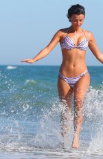 LUCY MECKLENBURGH in Bikini at the Beach in Italy
