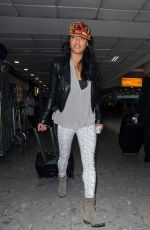 MICHELLE RODRIGUWEZ Arrives at Heathrow Airport in London