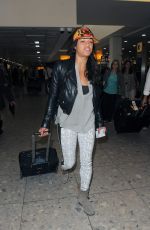 MICHELLE RODRIGUWEZ Arrives at Heathrow Airport in London