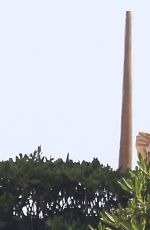 MILEY CYRUS in Bikini Top at a Pool in Barcelona