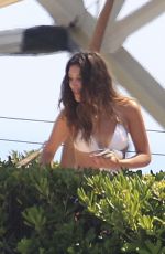 MILEY CYRUS in Bikini Top at a Pool in Barcelona