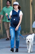 OLIVIA WILDE Walks Her Dog Out in New York