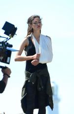 PHOEBE TONKIN on the Set of Take Down in Wales