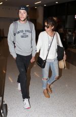 SARAH HYLAND at LAX Airport in Los Angeles