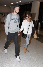 SARAH HYLAND at LAX Airport in Los Angeles