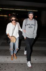 SARAH HYLAND at LAX Airport in Los Angeles