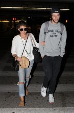 SARAH HYLAND at LAX Airport in Los Angeles