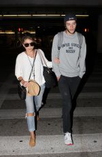 SARAH HYLAND at LAX Airport in Los Angeles