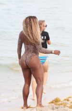 SERENA WILLIAMS and CAROLINE WOZNIACKI in Bikinis at a Beach in Miami