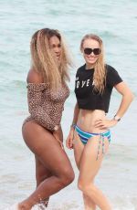 SERENA WILLIAMS and CAROLINE WOZNIACKI in Bikinis at a Beach in Miami