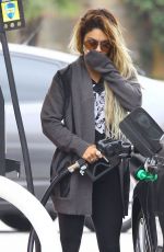 VANESSA HUDGENS at a Gas Station in Studio City