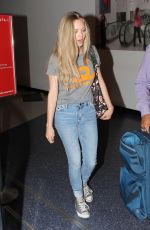 AMANDA SEYFRIED in Jeans at LAX Airport in Los Angeles