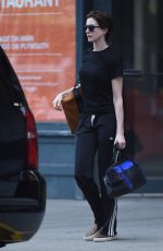 ANNE HATHAWAY Leaves Her Home in Brooklyn