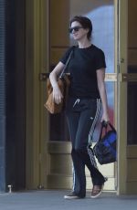 ANNE HATHAWAY Leaves Her Home in Brooklyn