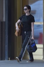 ANNE HATHAWAY Leaves Her Home in Brooklyn