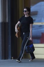 ANNE HATHAWAY Leaves Her Home in Brooklyn