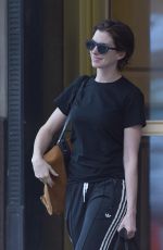 ANNE HATHAWAY Leaves Her Home in Brooklyn