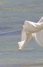 ASHLEY BENSON and SHAY MITCHELL in Bikinis at a Beach in Maui