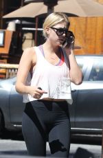 ASHLEY BENSON in Tights at Starbucks in Los Angeles
