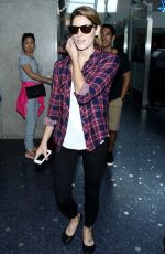 ASHLEY GREENE Arrives at LAX Airport in Los Angeles 1507