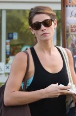 ASHLEY GREENE in Tights Shopping at Bristol Farms in West Hollywood