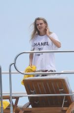 CARA DELEVINGNE in Bikini Celebrates Selena Gomez