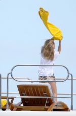 CARA DELEVINGNE in Bikini Celebrates Selena Gomez