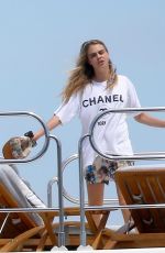 CARA DELEVINGNE in Bikini Celebrates Selena Gomez