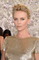 CHARLIZE THERON at Christian Dior Fashion Show in Paris