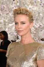 CHARLIZE THERON at Christian Dior Fashion Show in Paris