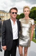 CHARLIZE THERON at Christian Dior Fashion Show in Paris