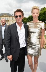 CHARLIZE THERON at Christian Dior Fashion Show in Paris