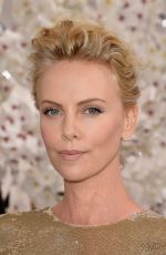 CHARLIZE THERON at Christian Dior Fashion Show in Paris