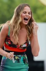 CHRISSY TEIGEN on the Set of Extra in universal City