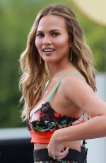 CHRISSY TEIGEN on the Set of Extra in universal City