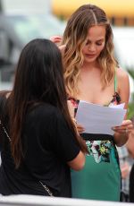 CHRISSY TEIGEN on the Set of Extra in universal City