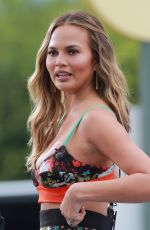 CHRISSY TEIGEN on the Set of Extra in universal City