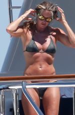 ELLE MACPHERSON in Bikini at a Yacht in Sardinia