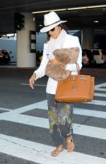 EVA LONGORIA Arrives at Los Angeles International Airport