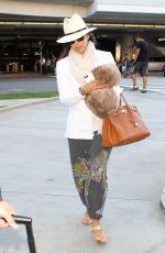 EVA LONGORIA Arrives at Los Angeles International Airport
