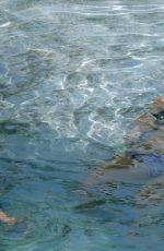 KALEY CUOCO in Bikini at a Pool in Mexico