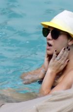 KALEY CUOCO in Bikini at a Pool in Mexico
