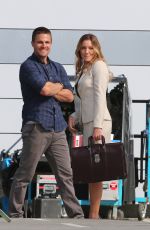KATIE CASSIDY on the Set of Arrow in Vancouver
