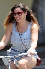 KELLY BROOK in Shorts Rides a Bike Out in Venice Beach
