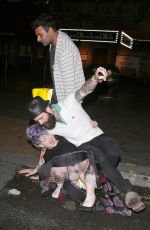 KELLY OSBOURNE Falling at a Restaurant in London