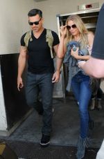LEANN RIMES and Eddie Cibrian Arrives at Los Angeles Inernational Airport