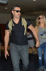 LEANN RIMES and Eddie Cibrian Arrives at Los Angeles Inernational Airport
