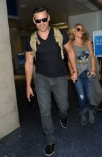 LEANN RIMES and Eddie Cibrian Arrives at Los Angeles Inernational Airport