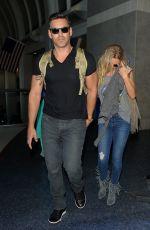 LEANN RIMES and Eddie Cibrian Arrives at Los Angeles Inernational Airport